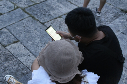 hnology Crosses a Line: How AI Is Changing Intimacy in Relationships Suggested Alt text: A couple sitting close together, with a smartphone visible between them, symbolizing the impact of technology and AI on emotional intimacy in relationships.